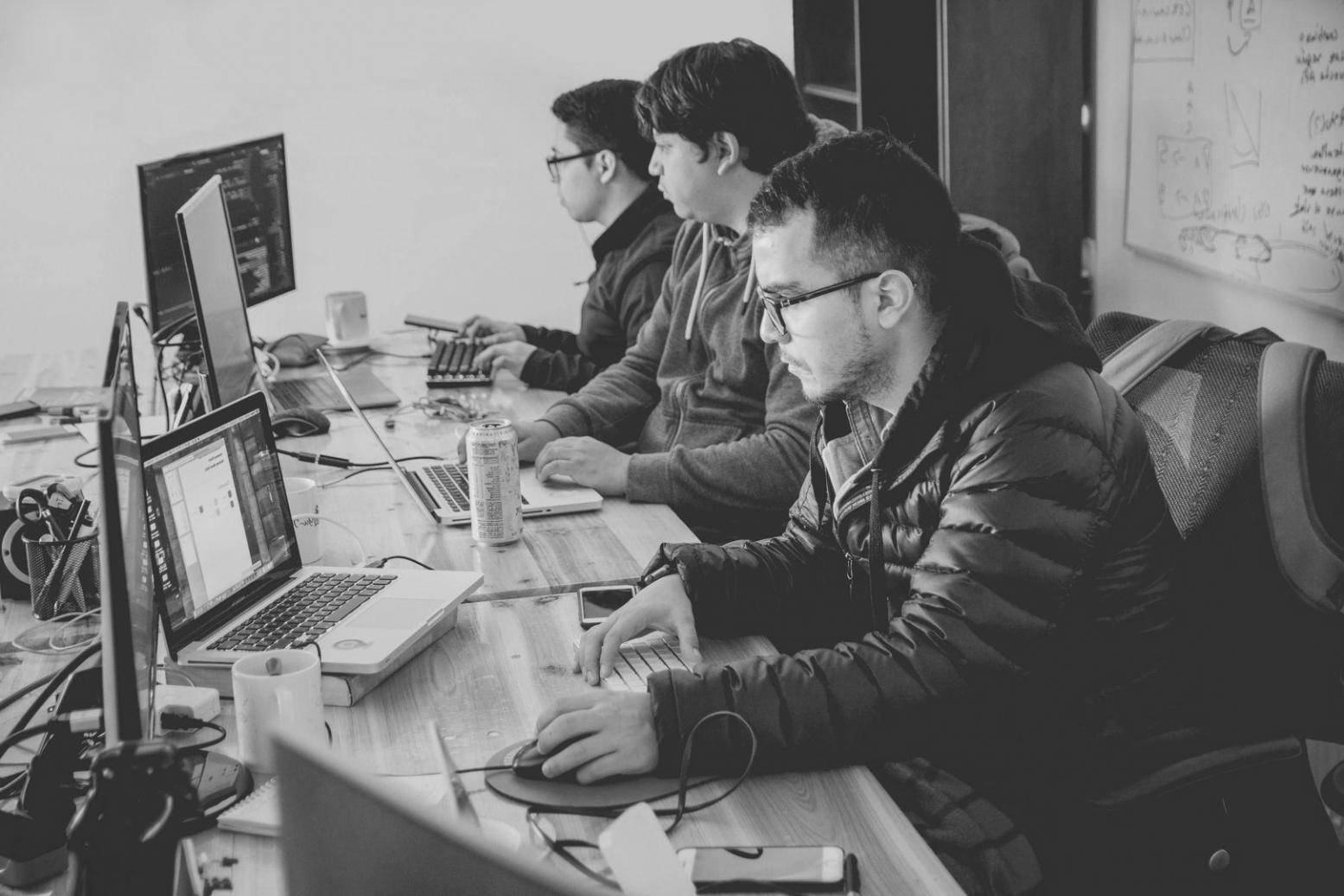 Financial analyst examining company balance sheets