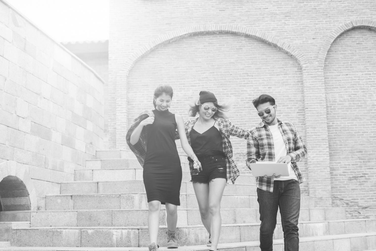 Professional reviewing financial documents with analytical charts